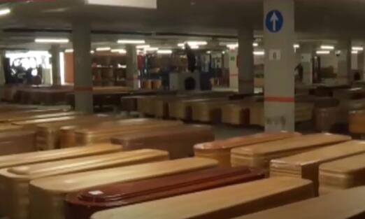 惨！西班牙改造停车场用以停尸，可容纳大量棺材停放