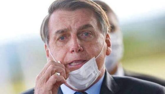 巴西总统确诊后面对记者摘口罩 高烧38度 行程全部取消